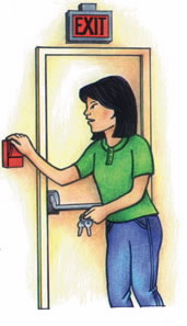 Person pulling fire alarm in building